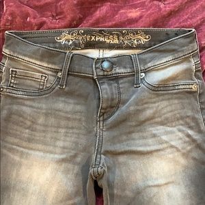 Express gray distressed skinny jeans